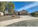 Charming single-story home with desert landscaping, a two-car garage, and a covered entryway at 5225 S Opal Pl, Chandler, AZ 85249