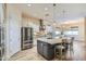 Well-equipped kitchen featuring stainless steel appliances, granite countertops, and a functional kitchen island at 5225 S Opal Pl, Chandler, AZ 85249
