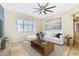 Inviting living room with a comfortable sofa, a large window with shutters, and stylish decor at 5225 S Opal Pl, Chandler, AZ 85249