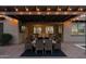 Enjoy the outdoor patio with comfortable seating and a view of the pool at 5225 S Opal Pl, Chandler, AZ 85249
