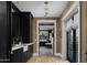 Elegant bathroom showcasing dark cabinetry, a soaking tub, and a spa-like atmosphere at 5915 E Calle Del Sud --, Phoenix, AZ 85018