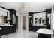 Spacious bathroom with dual vanities, a soaking tub, and luxurious finishes at 5915 E Calle Del Sud --, Phoenix, AZ 85018