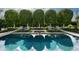 Relaxing pool area with lounge chairs, lush landscaping, and serene water features at 5915 E Calle Del Sud --, Phoenix, AZ 85018