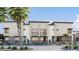 Modern townhome exterior with a mix of sleek stucco and stylish stone accents at 651 N Ironwood Dr # 2, Apache Junction, AZ 85120
