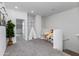Loft area with a cozy ' play area including a teepee and shelving with toys at 651 N Ironwood Dr # 3, Apache Junction, AZ 85120