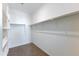 A spacious walk-in closet featuring ample shelving and storage for organization at 651 N Ironwood Dr # 3, Apache Junction, AZ 85120