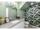 Stylish powder room featuring bold wallpaper, neutral walls, modern vanity with light countertop at 651 N Ironwood Dr # 4, Apache Junction, AZ 85120