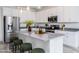Modern kitchen featuring a large island, stainless steel appliances, and stylish pendant lighting at 651 N Ironwood Dr # 4, Apache Junction, AZ 85120