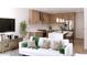 Open living space featuring modern kitchen with stainless steel appliances and cozy seating area at 651 N Ironwood Dr # 4, Apache Junction, AZ 85120