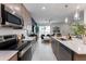 Open concept floorplan includes kitchen with bar seating flowing into the living room at 651 N Ironwood Dr # 7, Apache Junction, AZ 85120