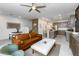 Modern living room featuring an open floor plan, leather sofa, and stylish decor at 651 N Ironwood Dr # 7, Apache Junction, AZ 85120