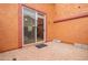 Private patio featuring brick pavers and sliding door access to the home's interior at 7172 S 48Th Gln, Laveen, AZ 85339