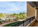 Scenic view from the balcony overlooking a tranquil lake and lush landscaping at 7175 E Camelback Rd # 307, Scottsdale, AZ 85251
