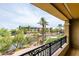 Scenic balcony view overlooking the canal with lush landscaping and palm trees at 7175 E Camelback Rd # 307, Scottsdale, AZ 85251