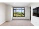 Bright bedroom with a large window offering scenic views and natural light at 7175 E Camelback Rd # 307, Scottsdale, AZ 85251