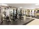 Modern gym equipped with weight machines, treadmills and elliptical trainers, providing residents with on-site fitness options at 7175 E Camelback Rd # 307, Scottsdale, AZ 85251