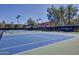 Enjoy a match on the community tennis courts, with pristine blue courts and desert landscaping at Gainey Ranch at 7710 E Gainey Ranch Rd # 223, Scottsdale, AZ 85258