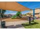 Community playground featuring shade, a green slide, and woodchips at 778 E Harper St # 101, Gilbert, AZ 85297