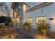 Welcoming facade featuring stone accents, modern lighting fixtures, and desert landscaping at 8713 N 80Th Pl, Scottsdale, AZ 85258