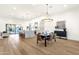 Spacious open floorplan blending the kitchen, dining, and living areas, with a view of the pool outside at 8713 N 80Th Pl, Scottsdale, AZ 85258