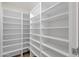 Spacious walk-in closet with custom shelving, providing ample storage space at 8713 N 80Th Pl, Scottsdale, AZ 85258