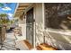 Inviting front porch with seating, security door, and exterior design elements at 1050 N 84Th Pl, Scottsdale, AZ 85257