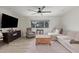 Stylish living room with a media console and neutral color scheme at 1050 N 84Th Pl, Scottsdale, AZ 85257