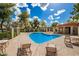 Community pool featuring clear blue water, lounge chairs, and plenty of open seating at 1050 N 84Th Pl, Scottsdale, AZ 85257