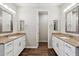 Bathroom boasting dual vanities with granite countertops and tile flooring at 10630 W Pinchot Ave, Avondale, AZ 85392