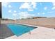 Private backyard swimming pool featuring an extended patio, perfect for entertaining or enjoying the sun at 10630 W Pinchot Ave, Avondale, AZ 85392