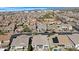 An aerial view of a beautiful neighborhood and the manicured lawns at 10633 E Sheffield Dr, Mesa, AZ 85212