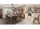 Open-concept dining area adjacent to the kitchen with modern decor at 11468 N Desert Hills Dr, Sun City, AZ 85351