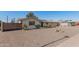 Single-story home with desert landscaping and a private fenced front yard at 11468 N Desert Hills Dr, Sun City, AZ 85351