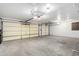 Spacious garage with multiple doors providing ample parking and storage space at 1227 W 12Th Ave, Apache Junction, AZ 85120