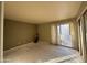 A bedroom with an attached sunroom and closet at 1384 N Santa Anna Ct, Chandler, AZ 85224