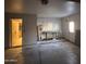 A large garage offers space for cars, storage, and opens to the house through a side door at 1384 N Santa Anna Ct, Chandler, AZ 85224