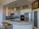 Bright kitchen featuring stainless steel appliances and granite countertops at 14850 E Grandview Dr # 233, Fountain Hills, AZ 85268