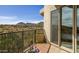 Patio featuring mountain views, desert landscape, and sliding glass doors at 14850 E Grandview Dr # 233, Fountain Hills, AZ 85268