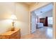 Bedroom with hardwood floors leading into an attached ensuite bathroom at 15237 S 47Th Way, Phoenix, AZ 85044