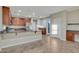 Well-lit kitchen features granite countertops, stainless steel appliances, and a door to the outside at 15635 W Montecito Ave, Goodyear, AZ 85395