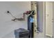 Utility Room with water heater and water softener and plumbing with concrete wall at 15635 W Montecito Ave, Goodyear, AZ 85395