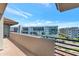 Enjoy a view from this balcony overlooking the community buildings with bright blue skies at 15802 N 71St St # 604, Scottsdale, AZ 85254