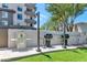 There are stainless steel grills and lush grass for enjoying time outdoors at 15802 N 71St St # 604, Scottsdale, AZ 85254