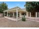 Landscaped backyard with a patio area that enhances outdoor living and entertaining at 16004 W Falcon Ridge Dr, Sun City West, AZ 85375