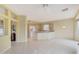 Bright kitchen featuring an open layout, tile floors, and light colored cabinets at 16004 W Falcon Ridge Dr, Sun City West, AZ 85375