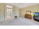 Spacious main bedroom featuring carpet floors, light walls, and a ceiling fan at 16004 W Falcon Ridge Dr, Sun City West, AZ 85375