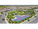 Aerial shot of the community amenities including tennis courts and well-maintained green spaces at 175 E Santa Lucia Ln, Queen Creek, AZ 85140