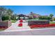 Entrance to the Algarve community with beautiful landscaping and a welcoming aesthetic at 175 E Santa Lucia Ln, Queen Creek, AZ 85140