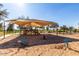 Playground for children with shade covering in community at 175 E Santa Lucia Ln, Queen Creek, AZ 85140