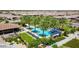 Aerial image showcases a community pool, palm trees, and comfortable lounge seating at 175 E Santa Lucia Ln, Queen Creek, AZ 85140